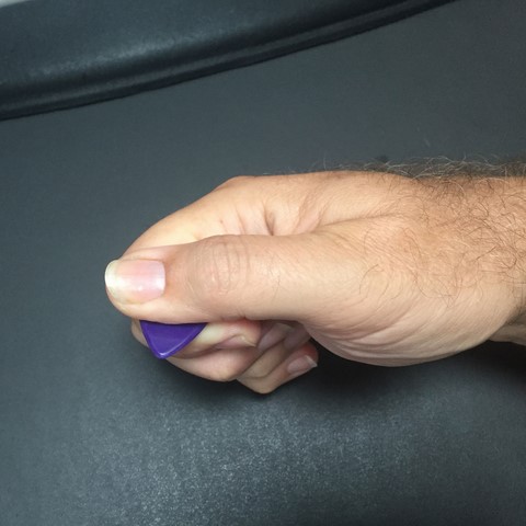 How to hold a guitar 2